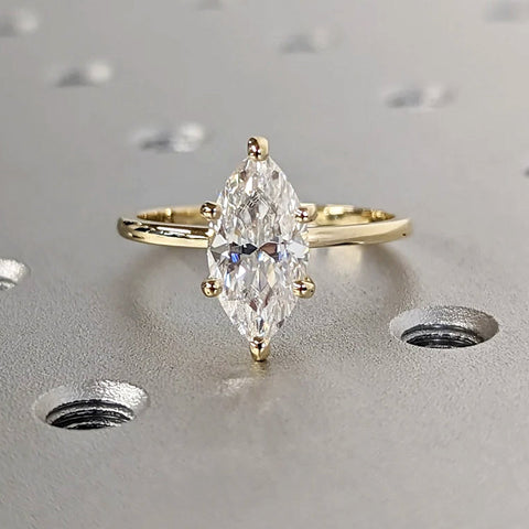 marquise central diamond elegantly ring